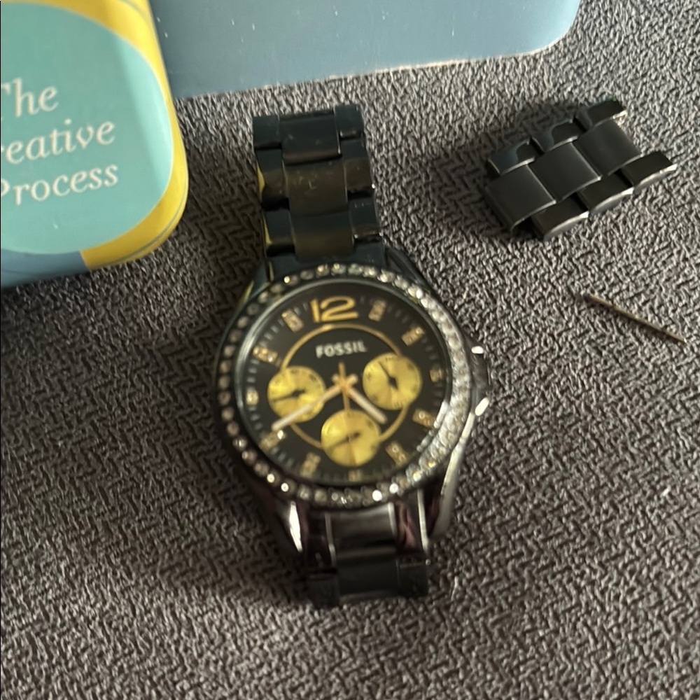Fossil Black and Gold Watch with Crystal Bezel